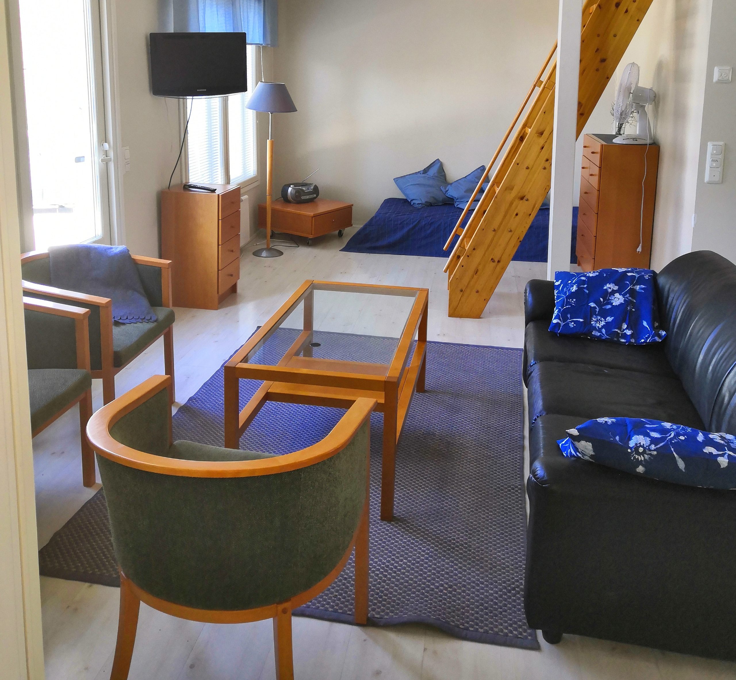 The living room with a sofa